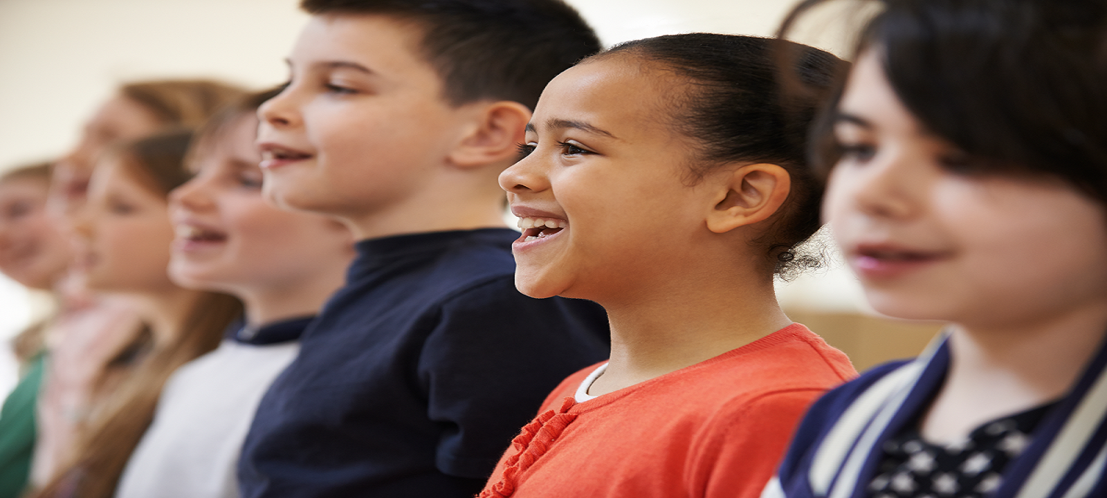 Children in straight line singing