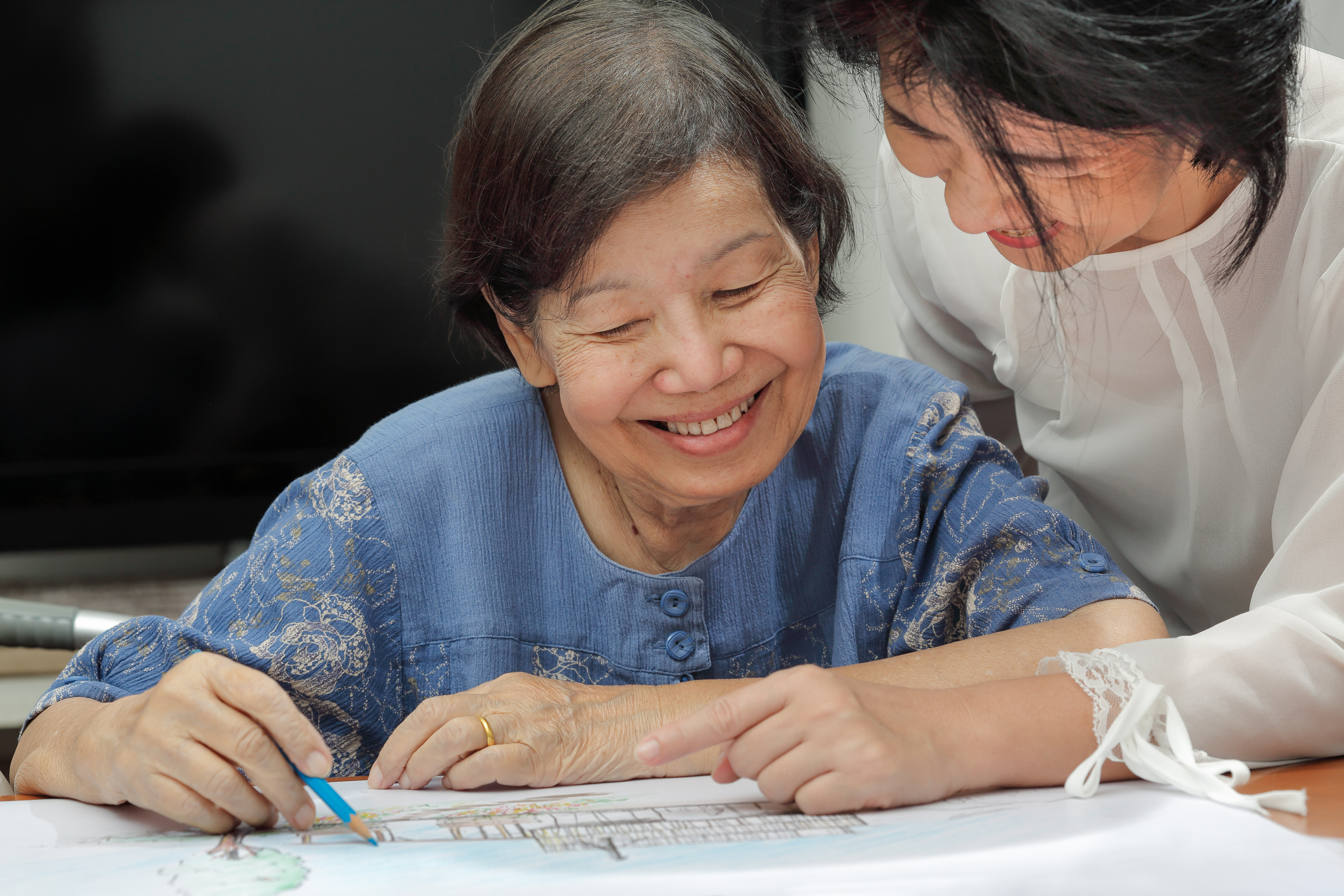 Asian women drawing