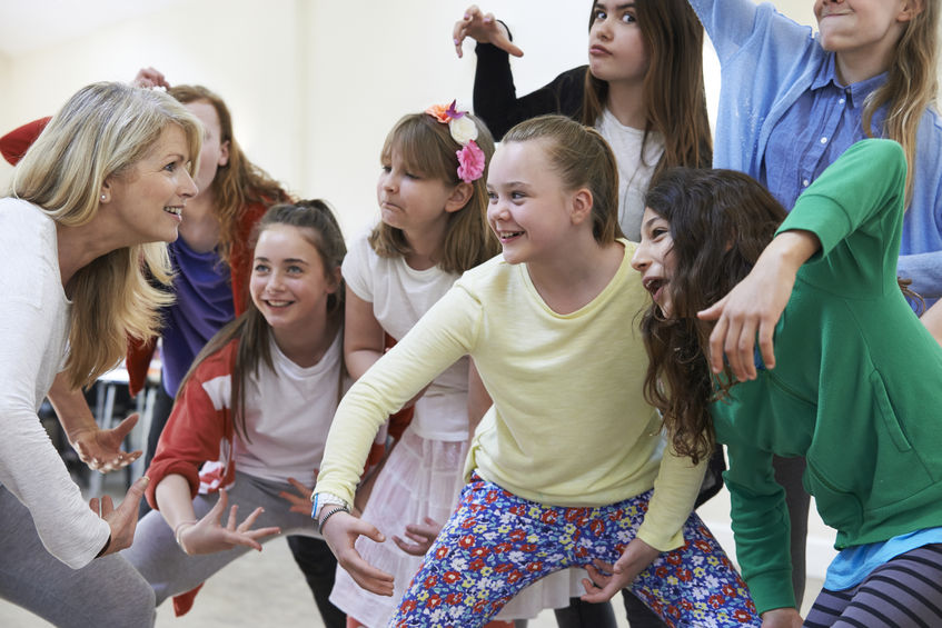 Children enjoying a drama class