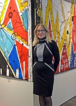 Barbara Ariss-Stroh-Wasser with artwork