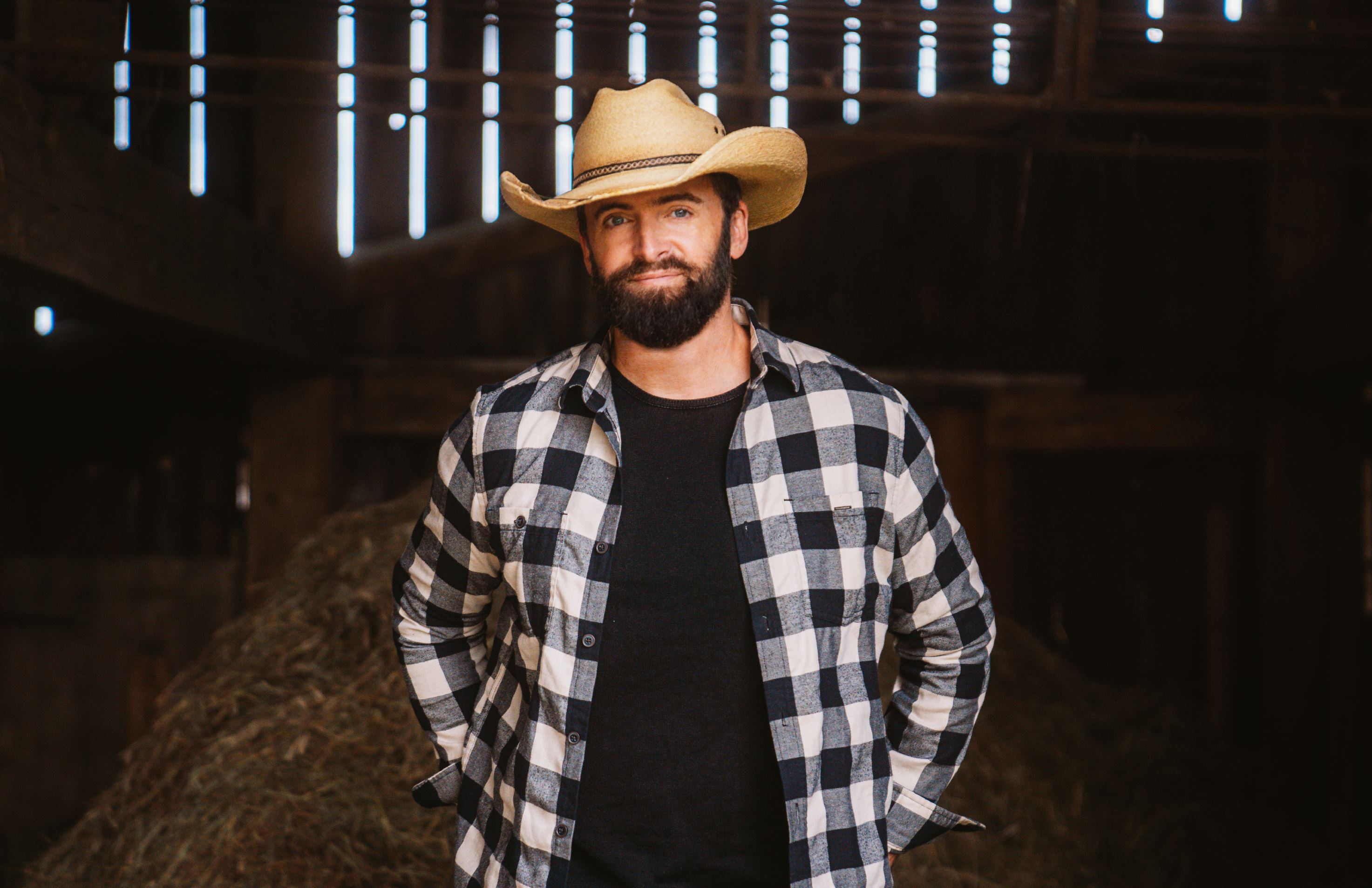 Dean Brody wearing a cowboy hat