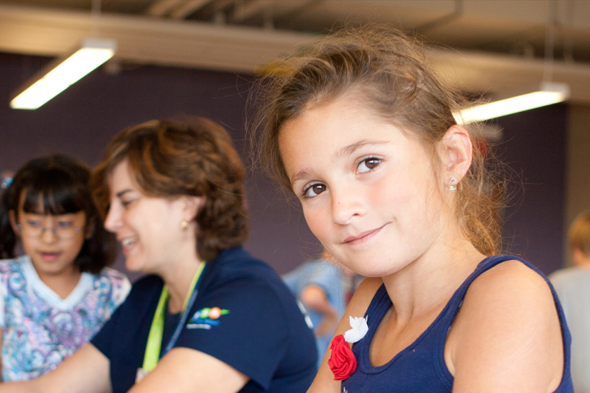 A young girl working on an art project